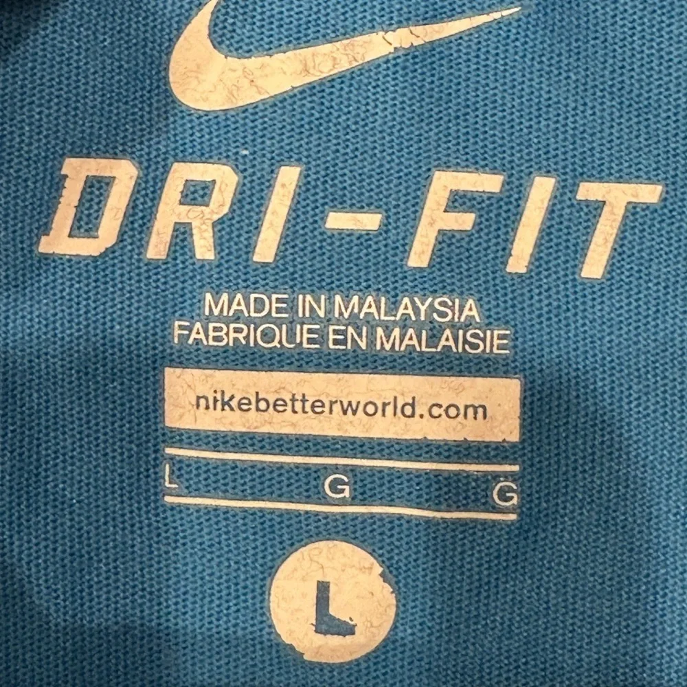 Nike Blue Tee with Vibrant Orange Text